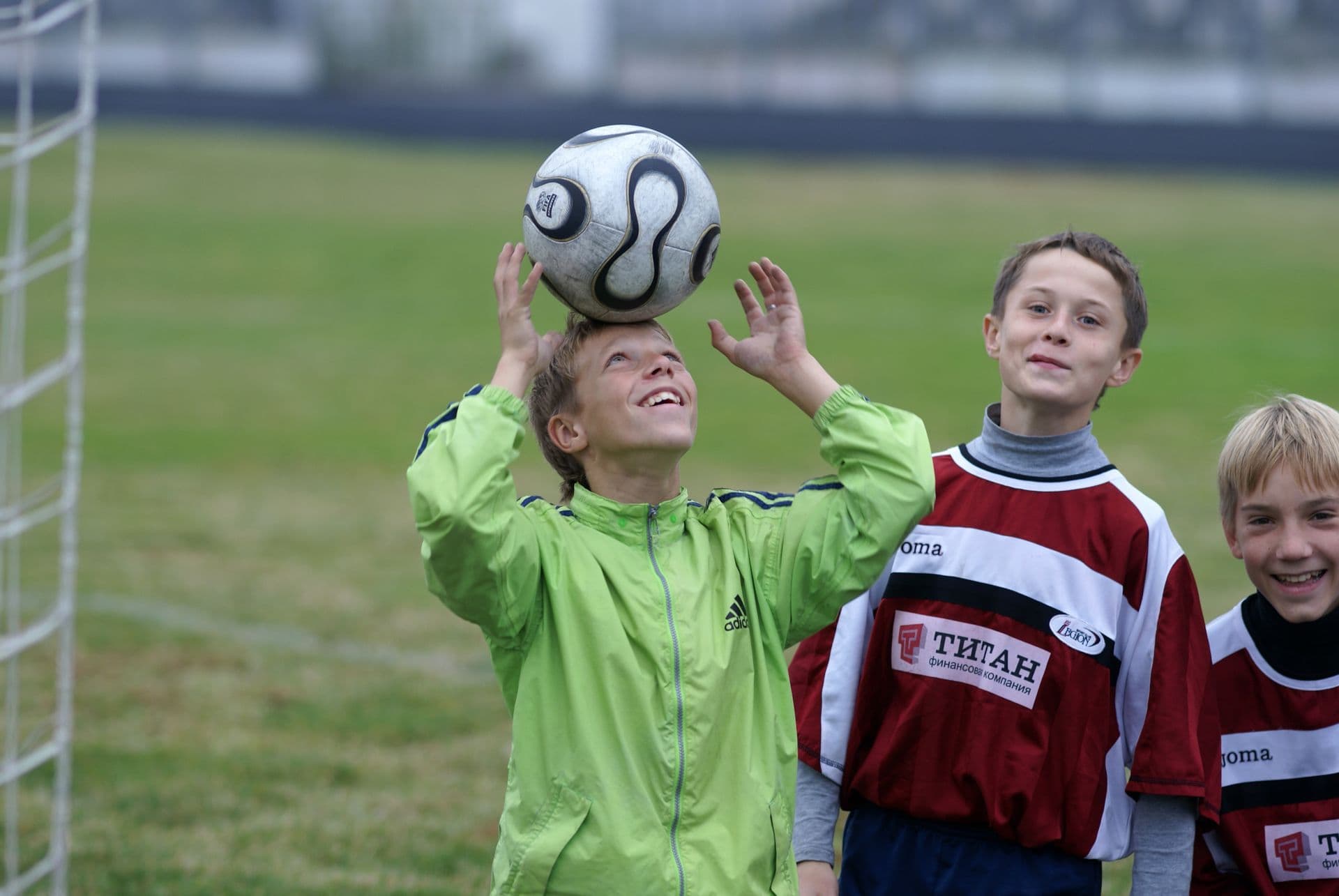 kids playing football and having fun